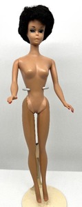 lot 62 image: Vintage 1961 Barbie Raven Hair BUBBLE CUT with Blue Eyes & Faded Pink Lips JAPAN