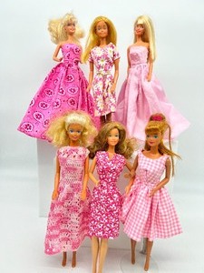 lot 174 image: Lot of 6 Pretty in Pink Barbies