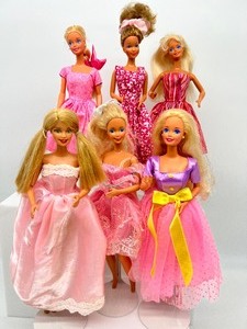 lot 180 image: Lot of 6 Barbies including Spring Blossom Outfit