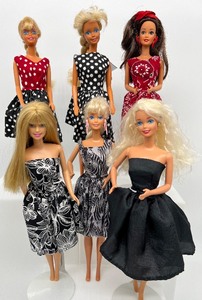 lot 181 image: Lot of 6 Barbies in Red, Black and White