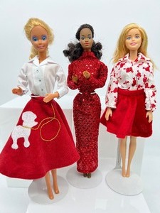 lot 183 image: Trio of Barbies including Poodle Skirt