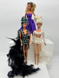 lot 186 image: Sparkles and Feathers Barbie Trio