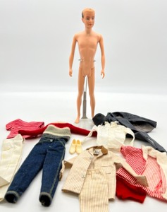 lot 43 image: Vintage 1961 KEN Brunette Flocked Hair With Lot of Original Clothing