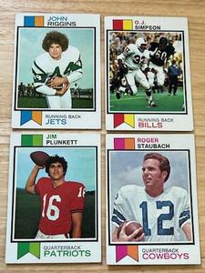 lot 42 image: 1973 Topps Football Card Lot - #500 OJ Simpson  #475 Roger Staubach  #355 Jim Plunkett  #245 John Riggins