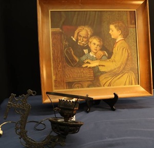 lot 77 image: ANTIQUE CORDED CAST IRON OIL LAMP AND ALBERT ANKER 1874 PRINT