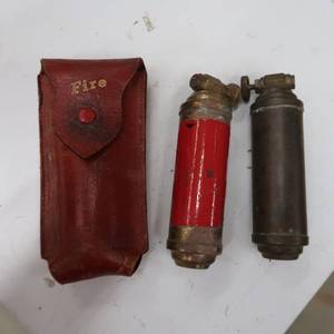 lot 94 image: VINTAGE BRASS MINI FIRE EXTINGUISHERS ONE WITH LEATHER CASE