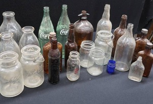 lot 110 image: VINTAGE BOTTLES AND JARS
