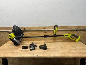 lot 22 image: RYOBI ONE 18V 13 in. Cordless Battery String TrimmerEdger with 1.5 Ah Battery and Charger
