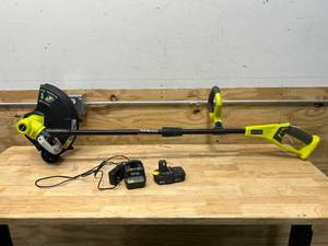 lot 54 image: RYOBI ONE 18V 13 in. Cordless Battery String TrimmerEdger with 1.5 Ah Battery and Charger
