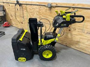 lot 2A image: RYOBI 40V HP BRUSHLESS WHISPER SERIES 24 TWO-STAGE SNOW BLOWER with 4- 6Ah Batteris and 2- Chargers