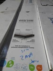 lot 114 image: Lifeproof - Harrington Acacia 7.5 in. x 48 in. Rigid Core Luxury Vinyl Plank Flooring (17.55 sq. ft.  carton) - 2 Cases