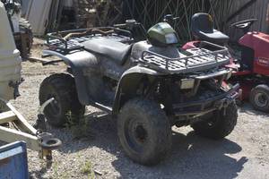 lot 9 image: Polaris Sportsman 4 wheeler