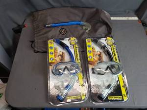 lot 17 image: US Divers Snorkels and Goggles New in Packages, One used snorkel too