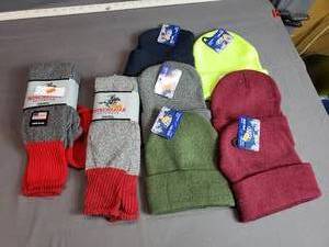 lot 48 image: 6 Stocking Caps and 2 Pair Winchester Socks