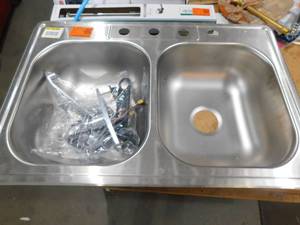 lot 38 image: Glacier Bay Drop-In Stainless Steel 33 in. 4-Hole Double Bowl Kitchen Sink