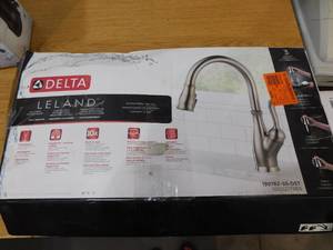 lot 52 image: Delta Leland Single-Handle Pull-Down Sprayer Kitchen Faucet with ShieldSpray in Stainless