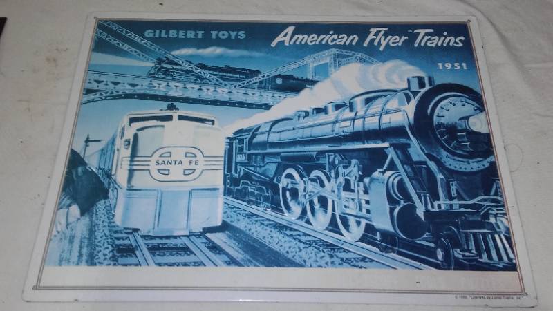 lot 573 image: American Flyer Trains metal sign.
