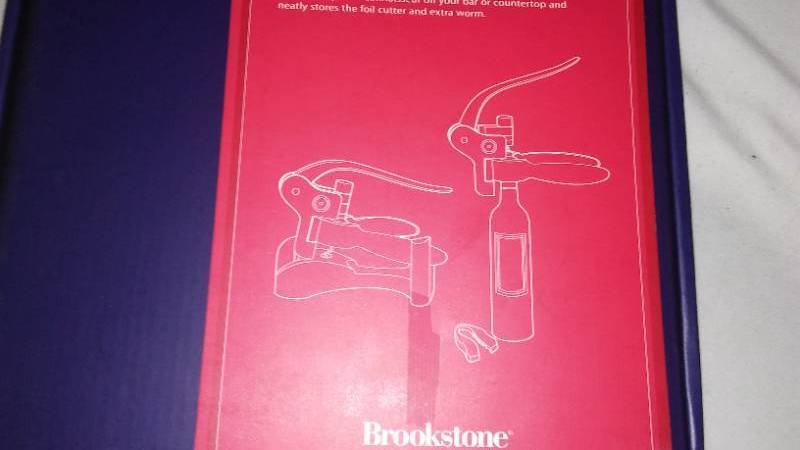 lot 585 image: Connoisseurs Wine Opener. NEW Brookstone..