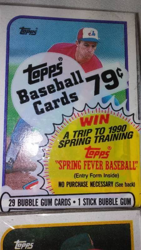 lot 614 image: 1989 Topps Baseball Cards. NEW (4) .