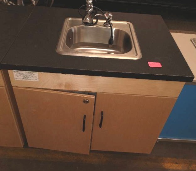 lot 200 image: Grade School sink and cabinet.