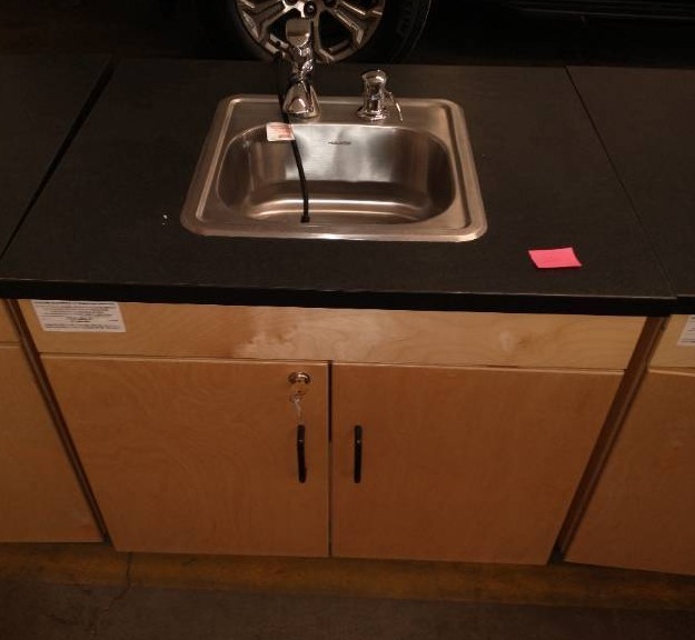lot 201 image: Grade School sink and cabinet
