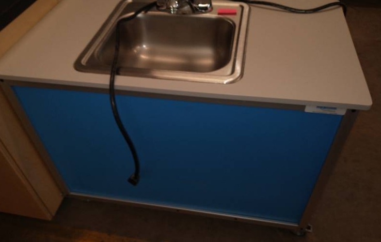 lot 203 image: Grade School sink and cabinet on casters