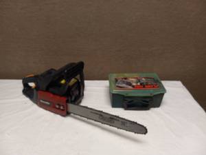 lot 51 image: HOMELITE GAS CHAINSAW WITH ACCESSORIES