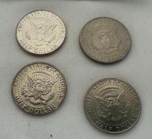 lot 9 image: LOT OF 4 NIFC KENNEDY HALF DOLLARS