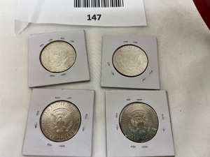 lot 147 image: LOT OF 4 NIFC KENNEDY HALF DOLLARS