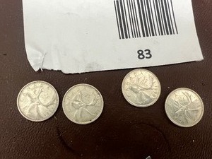 lot 83 image: LOT OF 4 CANADIAN QUARTERS FROM 1960S SILVER