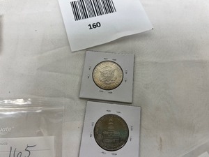 lot 160 image: LOT OF 2 KENNEDY HALF DOLLARS TONING