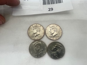 lot 29 image: LOT OF 4 KENNEDY HALF DOLLARS