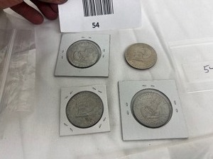 lot 54 image: LOT OF 4 IKE DOLLAR COINS
