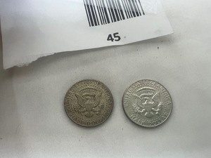 lot 45 image: LOT OF 2 SILVER KENNEDY HALF DOLLARS