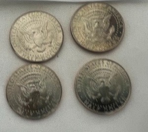 lot 12 image: LOT OF 4 NIFC KENNEDY HALF DOLLARS