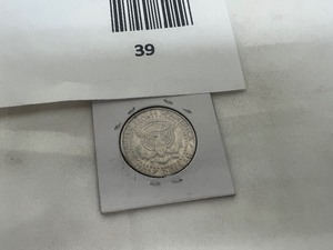 lot 39 image: KENNEDY HALF DOLLAR ERROR COIN