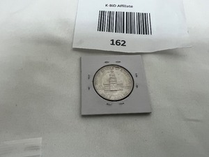 lot 162 image: 1976D KENNEDY HALF DOLLAR ERROR COIN