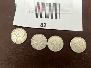 lot 82 image: LOT OF 4 CANADIAN QUARTERS FROM 1960S SILVER