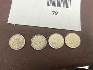 lot 79 image: LOT OF 4 CANADIAN QUARTERS FROM 1960S SILVER