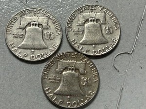(3) 1957 Franklin Silver Half Dollars -- (2) D & (1) P Mints