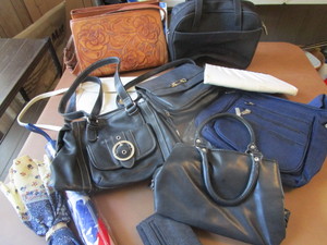 lot 215 image: Purses, Umbrellas