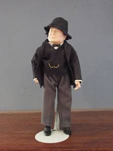 lot 162 image: Books and Doll