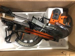 RIDGID 15 Amp Corded 12 in. Dual Bevel Sliding Miter Saw with 70 Deg. Miter Capacity and LED Cut Line Indicator  Customer Returns See Pictures