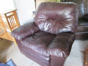 lot 105 image: Cherry Toned oversized rocking recliner
