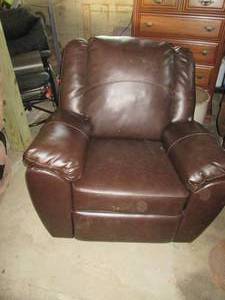lot 115 image: Near new leather like rocking Recliner