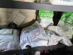lot 126 image: Full 12 cu.ft. bag of river pebble.