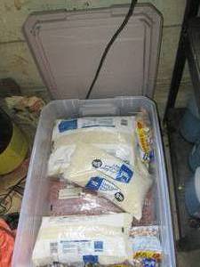 lot 143 image: Plastic tote of beans and rice
