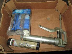 lot 60 image: Mini-sized grease gun