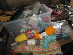 lot 64 image: Covered tote full of yarns