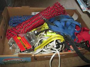 lot 66 image: Fruit flat full of ratchet straps, plus